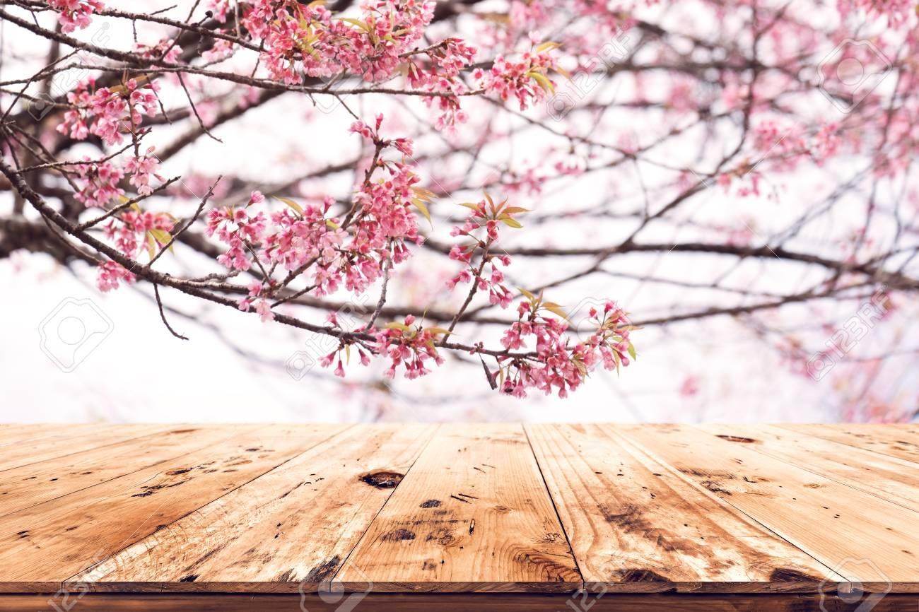 Cherry blossom over a wooden table